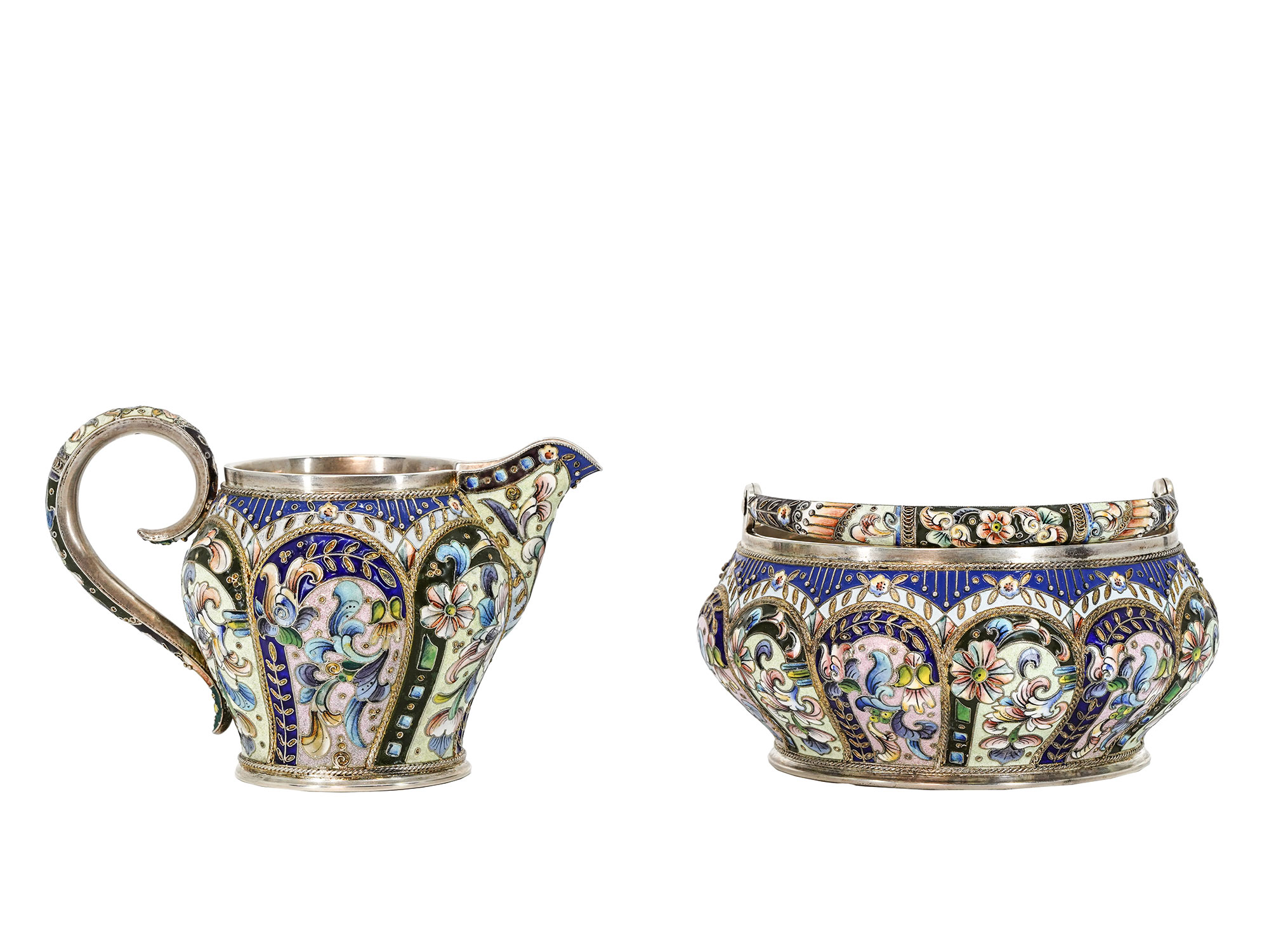 A MAGNIFICENT RUSSIAN TWO-PIECE GILT-SILVER ENAMEL SET, MOSCOW, 1908-17