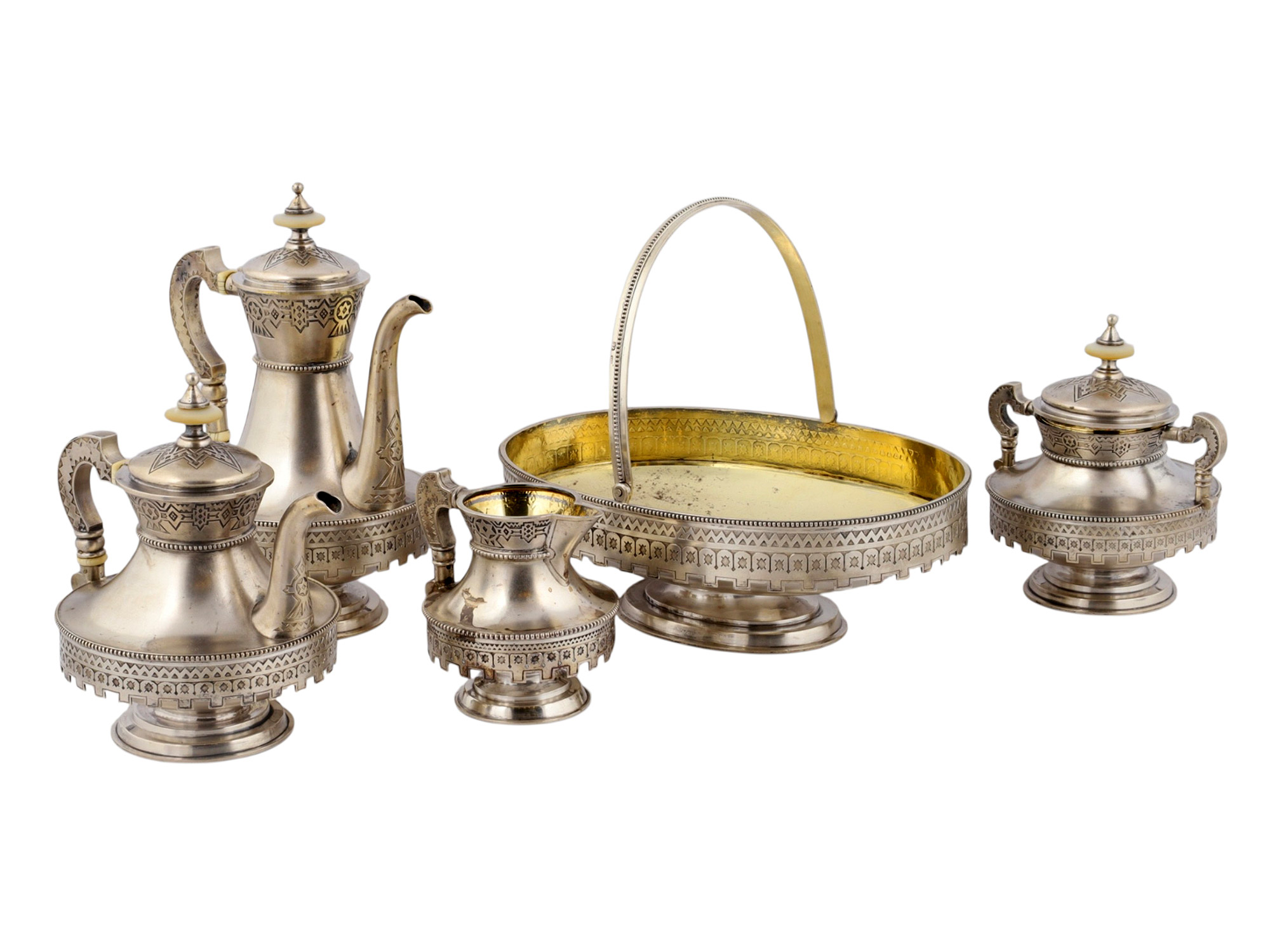 A RUSSIAN SILVER AND PARCEL-GILT PAN-SLAVIC FIVE-PIECE TEA AND COFFEE SERVICE, MOSCOW, 1880
