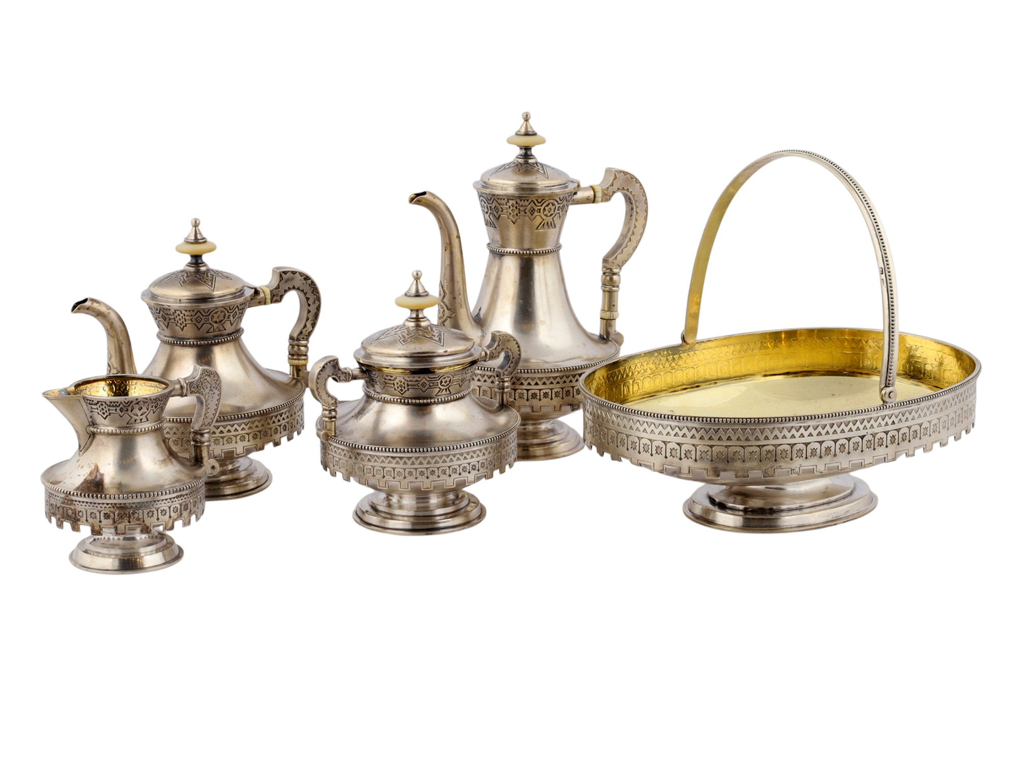 A RUSSIAN SILVER AND PARCEL-GILT PAN-SLAVIC FIVE-PIECE TEA AND COFFEE SERVICE, MOSCOW, 1880