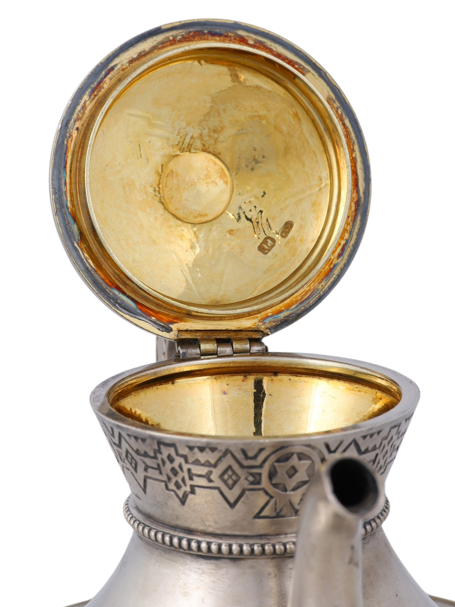 A RUSSIAN SILVER AND PARCEL-GILT PAN-SLAVIC FIVE-PIECE TEA AND COFFEE SERVICE, MOSCOW, 1880