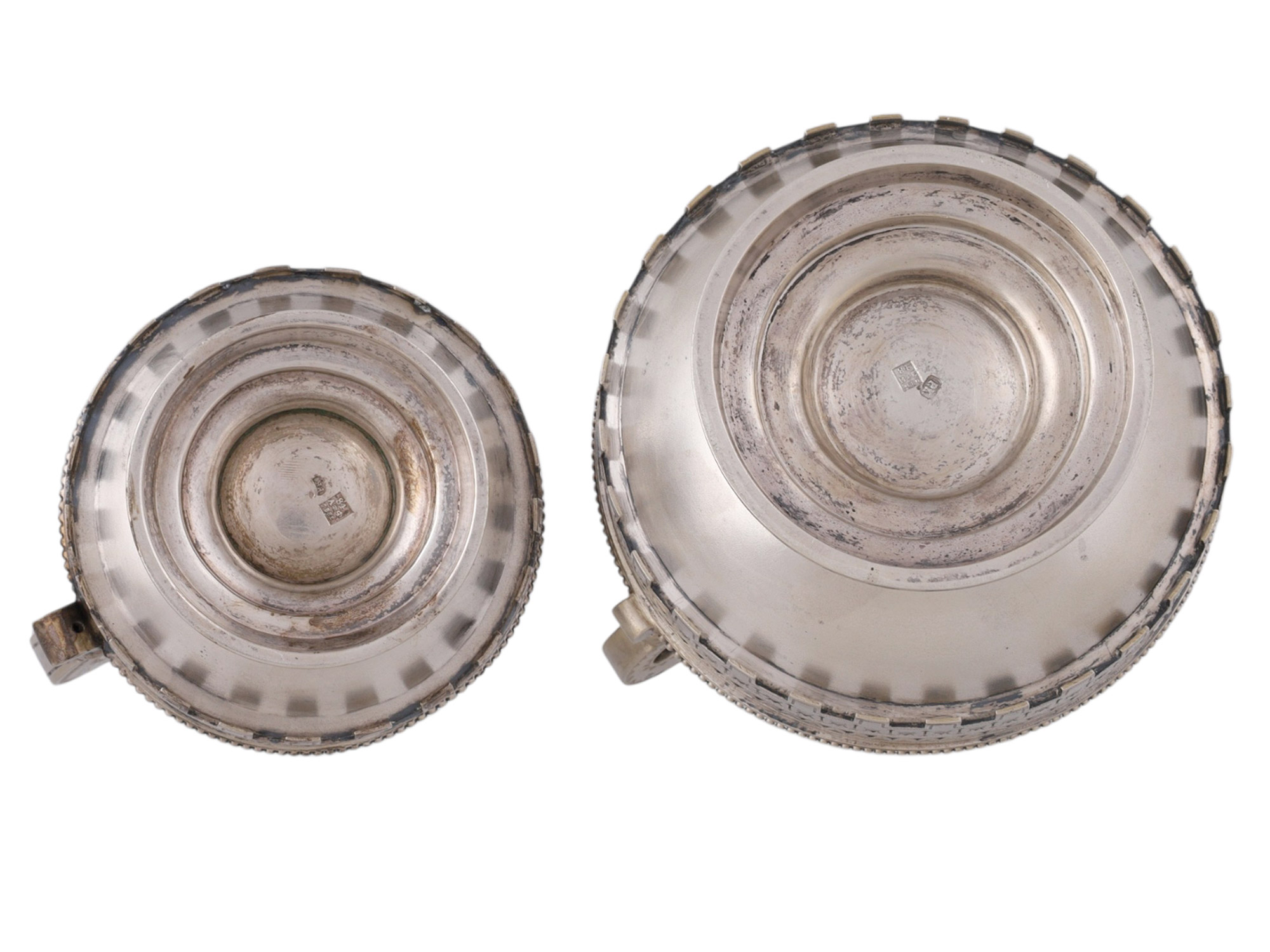 A RUSSIAN SILVER AND PARCEL-GILT PAN-SLAVIC FIVE-PIECE TEA AND COFFEE SERVICE, MOSCOW, 1880