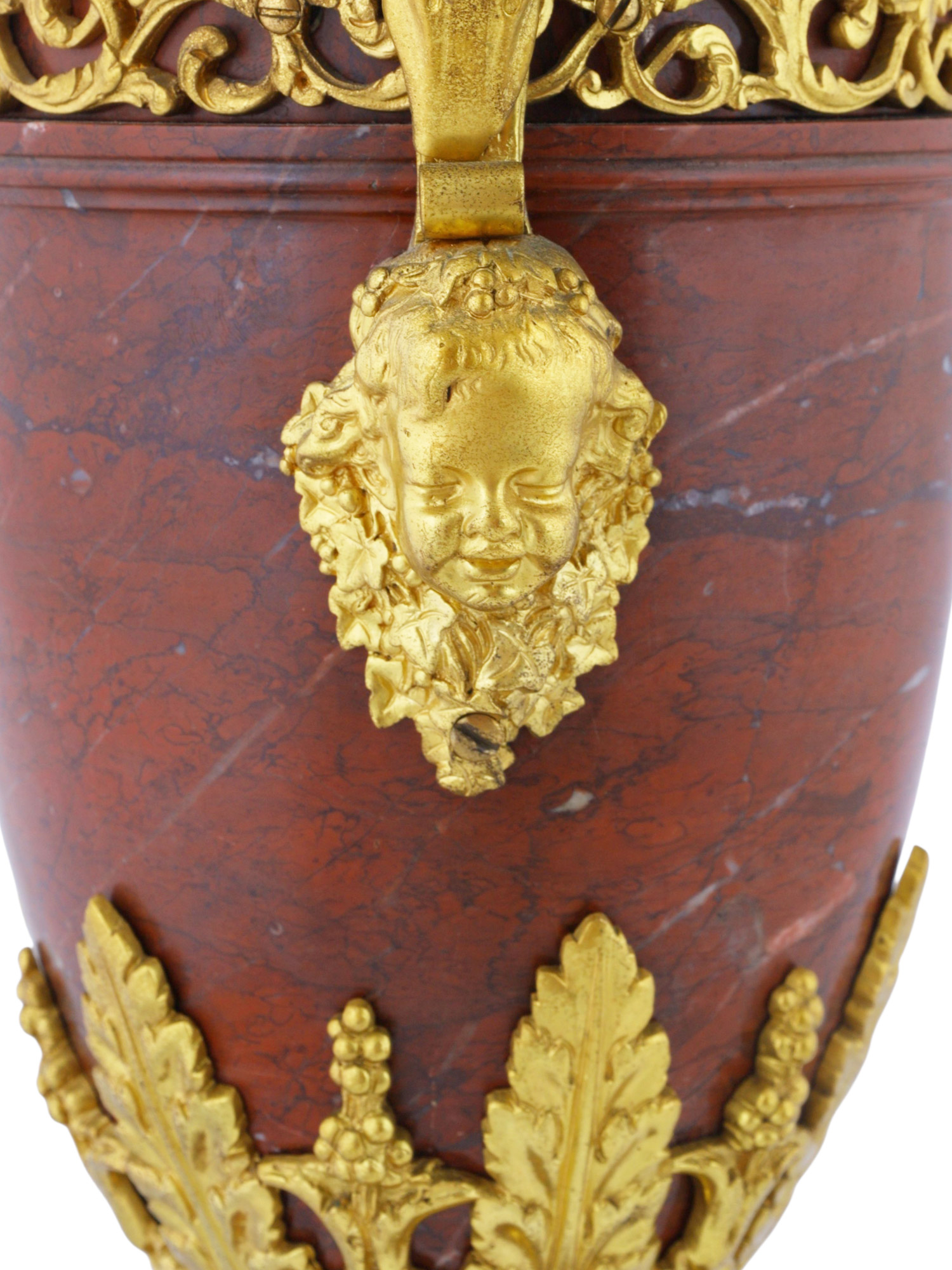 A PAIR OF 19TH CENTURY NAPOLEON III ORMOLU MOUNTED RED JASPER EWERS