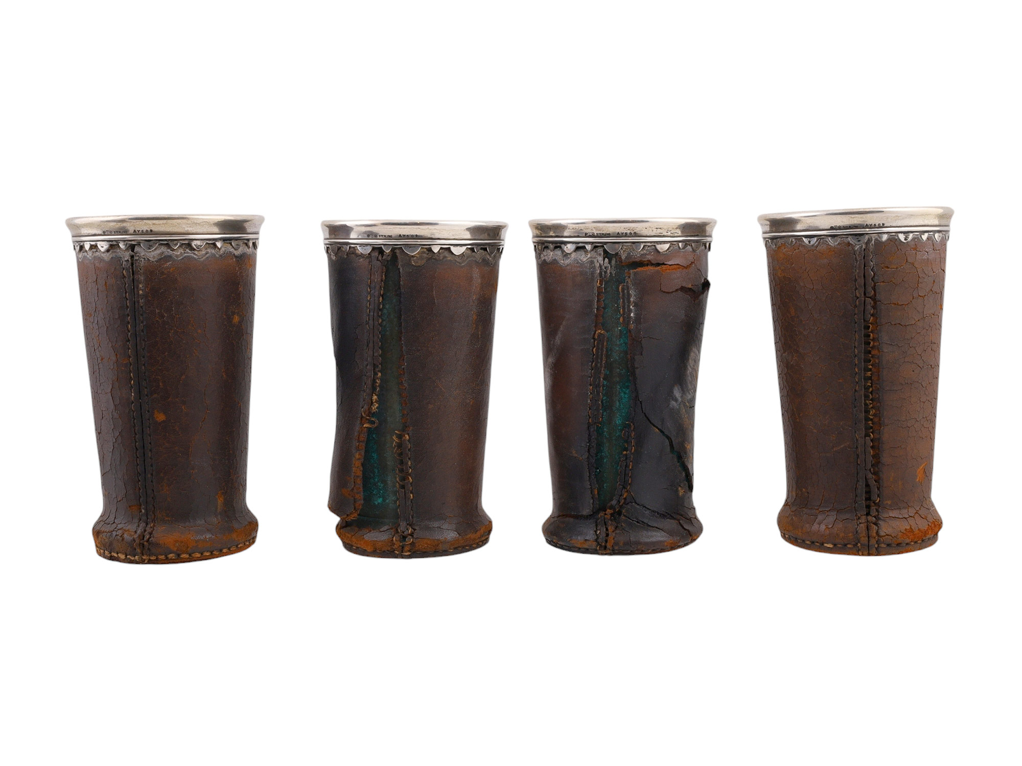 A 1906 SAN FRANCISCO FIRE AMERICAN GORHAM SILVER AND LEATHER DRINKING SET, 13 PIECES AND NEWSPAPER