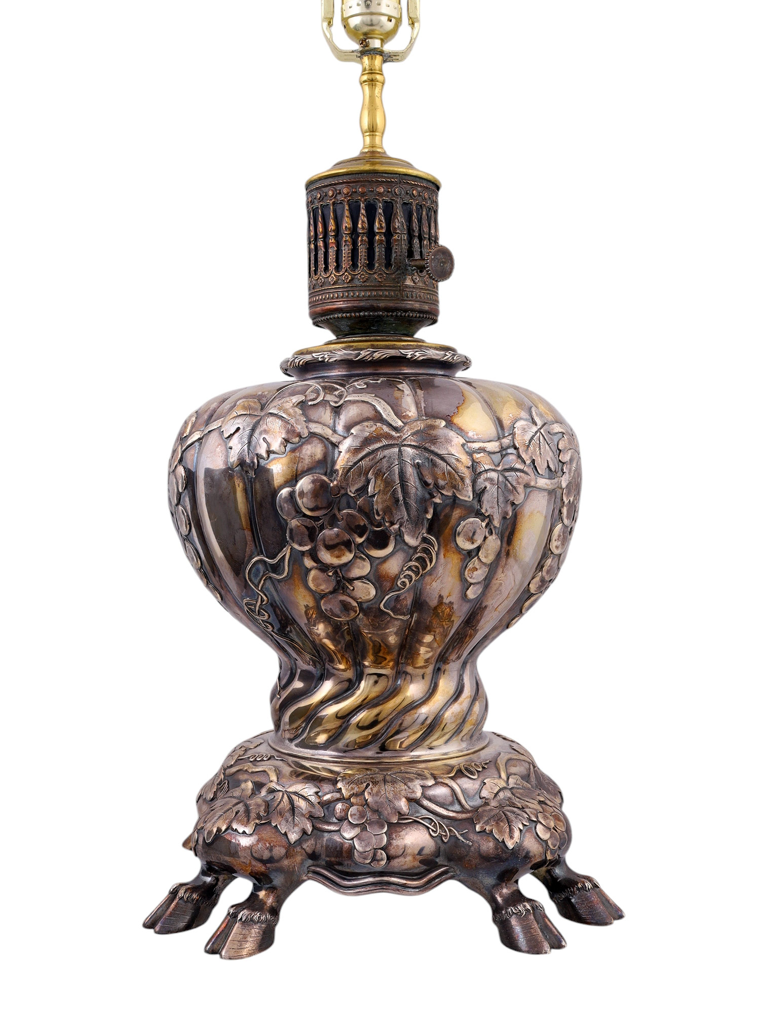 A SILVERED LAMP WITH COW FEET, CONVERTED TO ELECTRIC, PROBABLY GERMAN