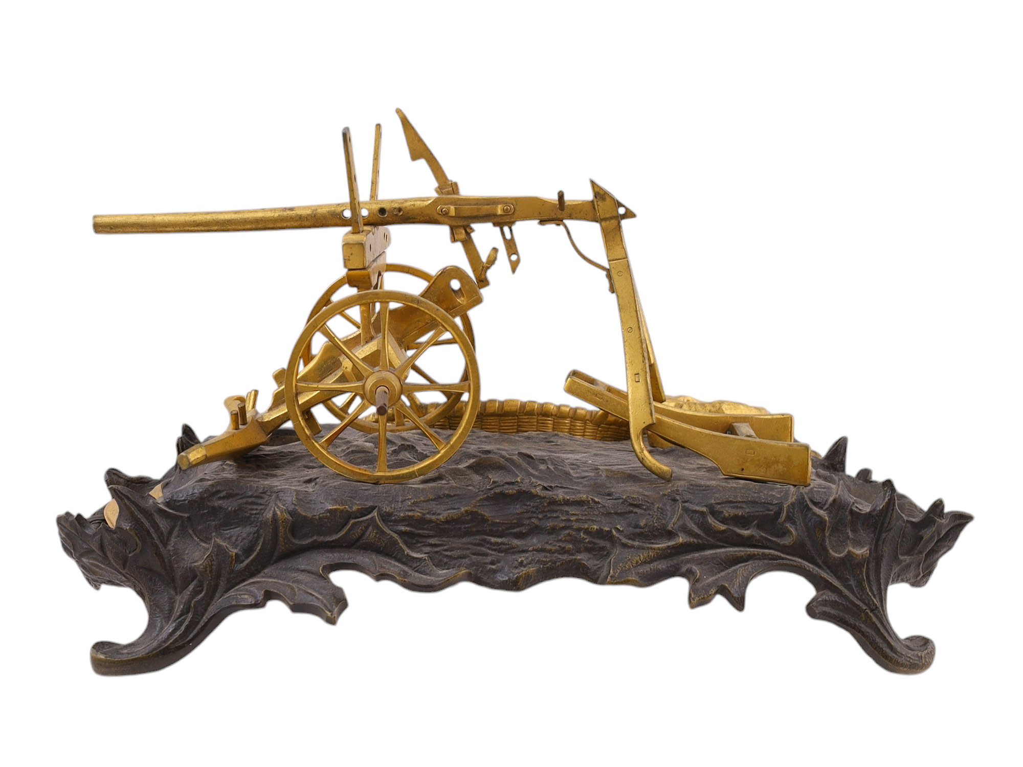 A BRONZE INKWELL REPRESENTING A PLOUGH, 19TH CENTURY.