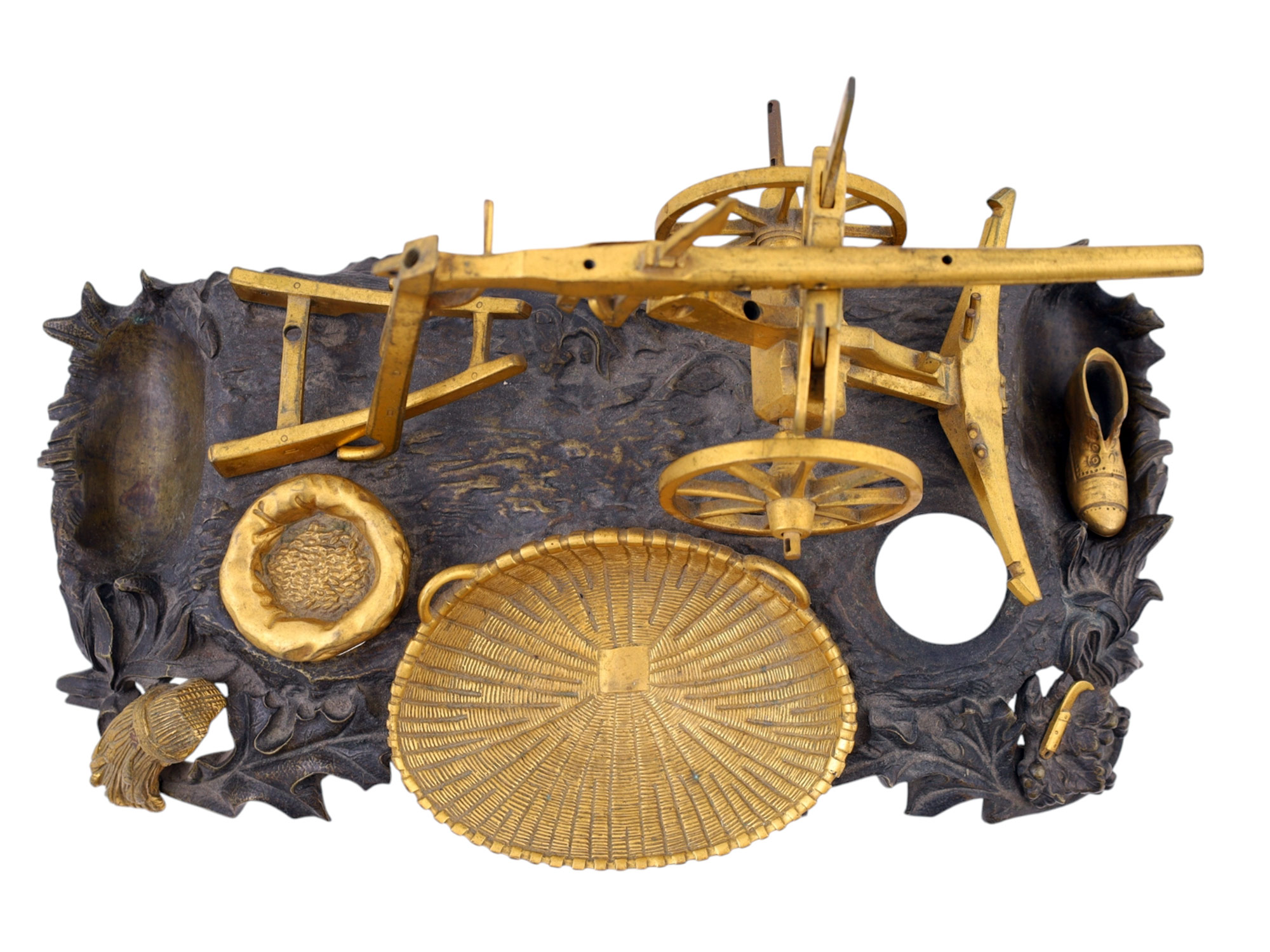 A BRONZE INKWELL REPRESENTING A PLOUGH, 19TH CENTURY.