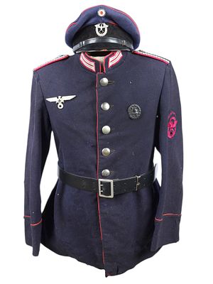 A WWII GERMAN FIRE BRIGADE UNIFORM GROUP WITH VISOR CAP AND BELT. A German Feuerwehr fire 