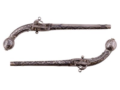 A PAIR OF EXTREMELY FINE CAUCASIAN SILVER FLINTLOCK PISTOLS, 19TH CEN. A pair of matching 