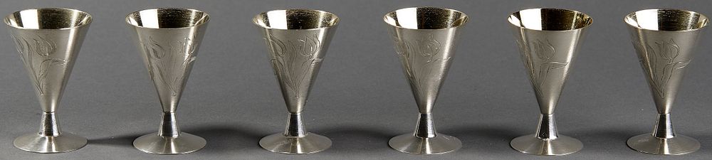 SET OF SIX RUSSIAN SILVER VODKA GLASSES DECORATED WITH TULIPS. Hallmarks: Russian silver 