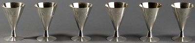 SET OF SIX RUSSIAN SILVER VODKA GLASSES DECORATED WITH TULIPS. Hallmarks: Russian silver 
