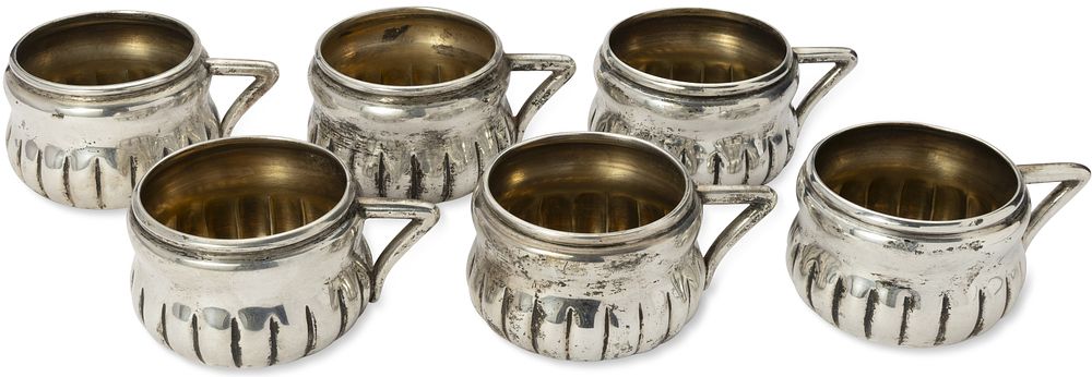 SIX PARCEL-GILT SILVER CUPS
Austria-Hungary, 1867 - 1872. Hallmarks: Diana’s head and number ‘3’ 