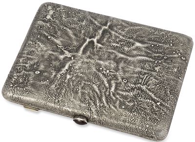 RUSSIAN SILVER-GILT SAMORODOK CIGARETTE CASE WITH A RED CABOCHON
St Petersburg, 1908-1917. Hallma 