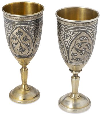 PAIR OF SOVIET PARCEL-GILT SILVER AND NIELLO FLUTES
Moscow, after 1958. Hallmarks: ‘875’ silver 