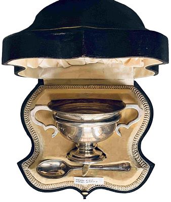 WALKER & HALL SILVER CUP AND SPOON
Sheffield, England, circa 1909. Hallmarks: crown, lion 