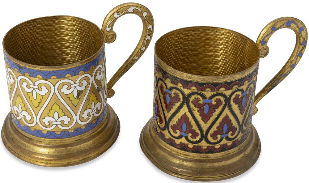 PAIR OF SOVIET METAL AND ENAMEL TEA GLASS HOLDERS
Leningrad Jewellery Factory, 1958. Hallmarks: 
