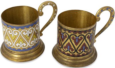 PAIR OF SOVIET METAL AND ENAMEL TEA GLASS HOLDERS
Leningrad Jewellery Factory, 1958. Hallmarks: 