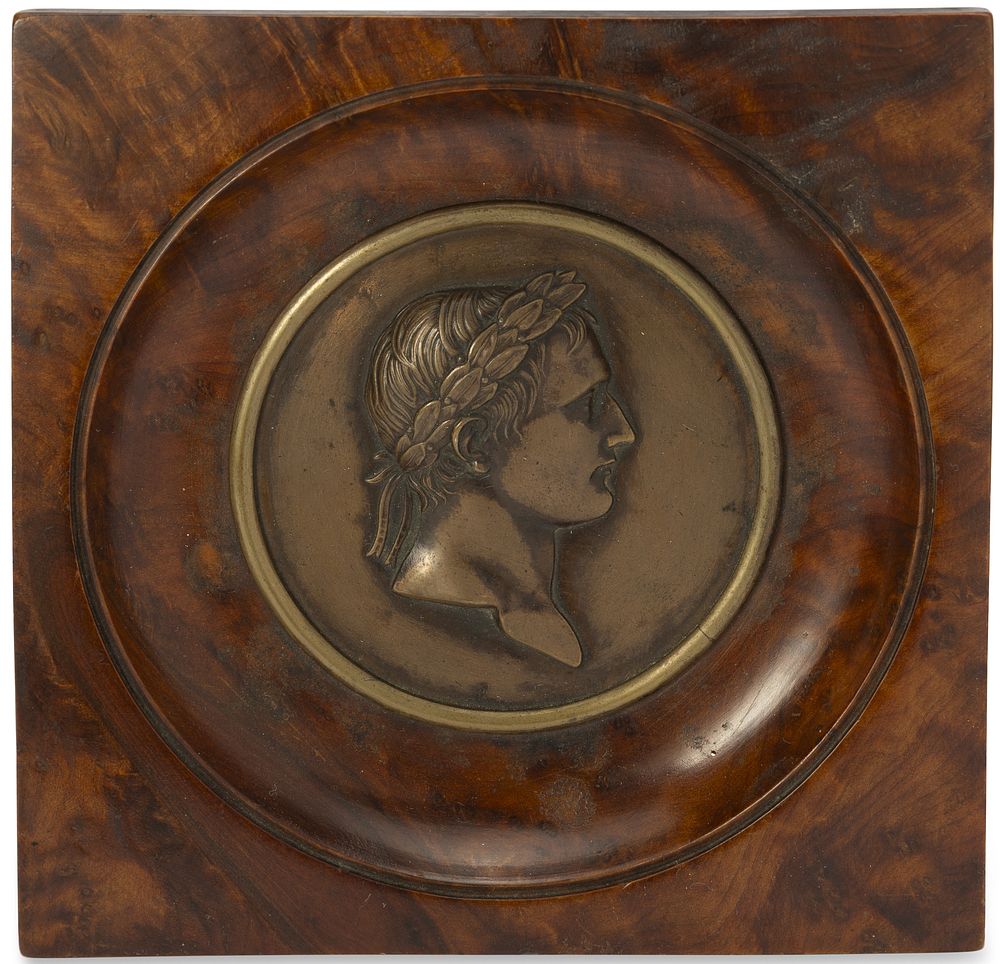 BRONZE RELIEF PLAQUE OF THE EMPEROR NAPOLEON WITH A VICTOR’S LAUREL
France, early 19th century. D 