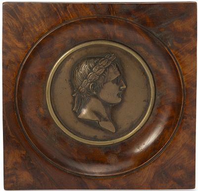 BRONZE RELIEF PLAQUE OF THE EMPEROR NAPOLEON WITH A VICTOR’S LAUREL
France, early 19th century. D 