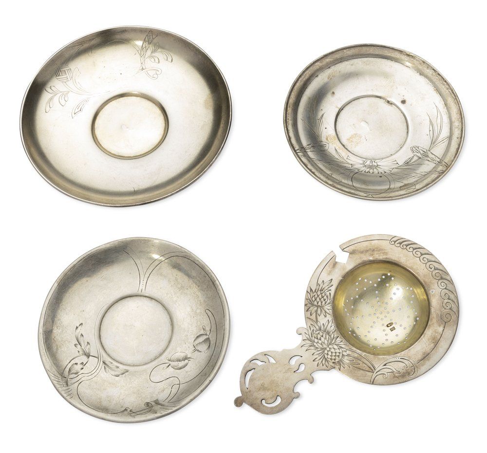 GROUP OF THREE RUSSIAN SILVER SAUCERS AND A TEA STRAINER, late 19th-early 20th century
. includin 