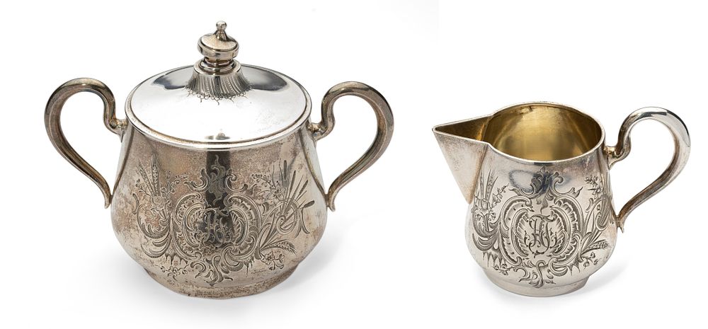 TEA SET COMPRISING PARCEL-GILT SILVER SUGAR BOWL AND CREAMER WITH MONOGRAM ‘AD’ AND FLORAL 