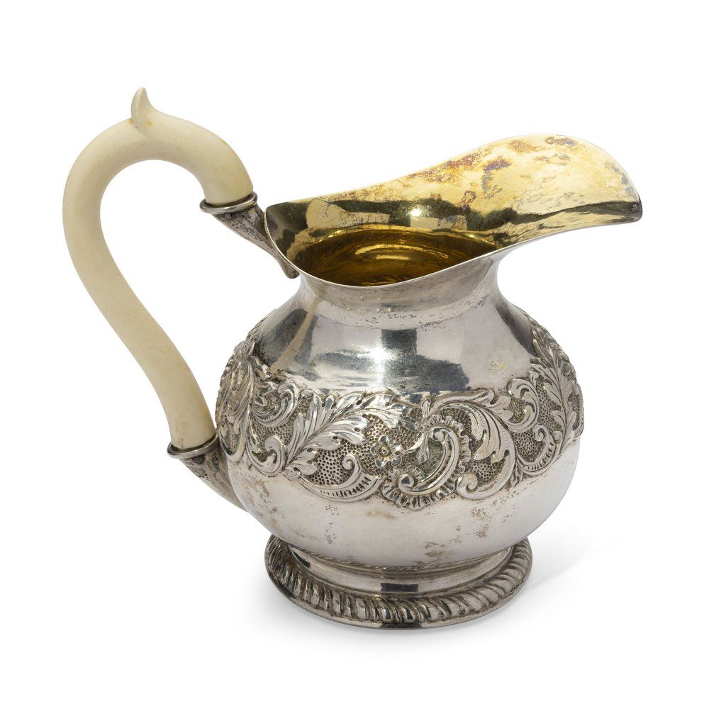RADKE POLISH PARCEL-GILT SILVER CREAMER WITH HANDLE
Mark of Emil Radke, Warsaw, mid-19th Century. 