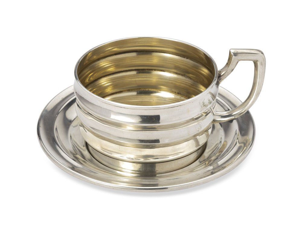 SILVER CUP WITH A MATCHING SAUCER
Latzko, Pest, Austro-Hungarian Empire, circa 1866-1918. Hallmar 