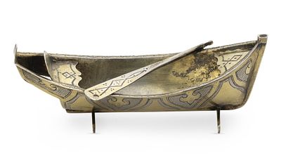 RUSSIAN SILVER-GILT SALT CELLAR SHAPED AS A BOAT WITH PADDLE
St Petersburg, 1899-1908. Hallmarks: 