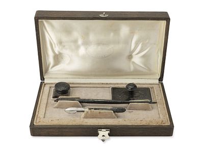 ANTIQUE IRON WRITING SET IN FITTED CASE, LATE 19TH-CENTURY. Comprising: -an iron letter opener 