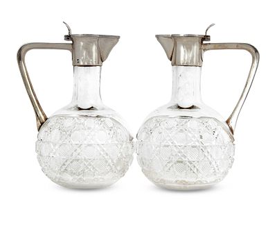 K. LINKE PAIR OF RUSSIAN SILVER-GILT MOUNTED CUT-CRYSTAL DECANTERS
Konstantin Linke likely for 