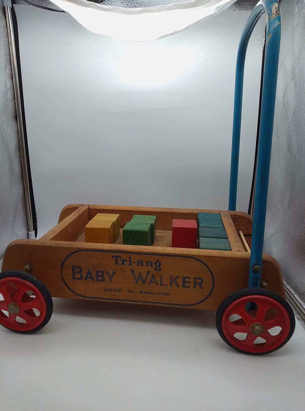Lot 155: Tri-Ang Baby Walker/Stroller and bricks