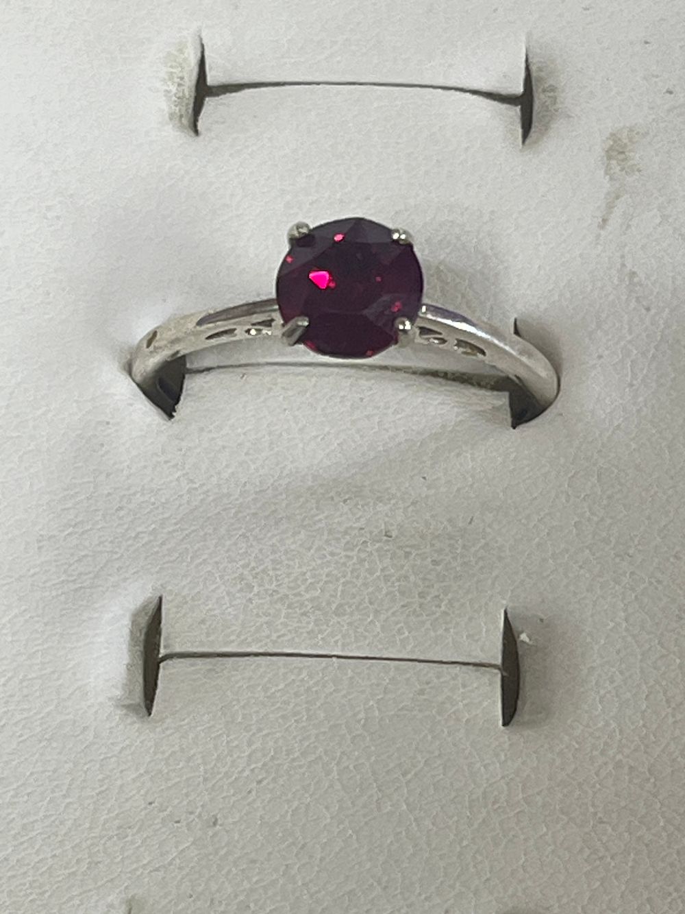 Lot 167: Stamped 925 Silver ring size S solitaire red...