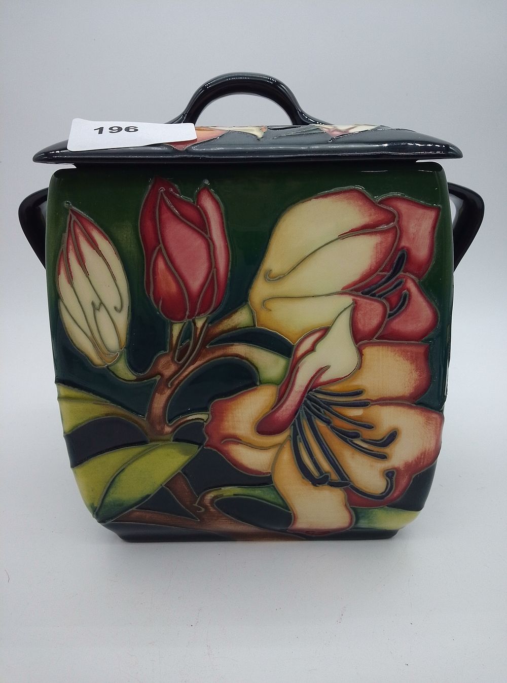 Lot 196: A MOORCROFT PENCARROW PATTERN BOX AND COVER