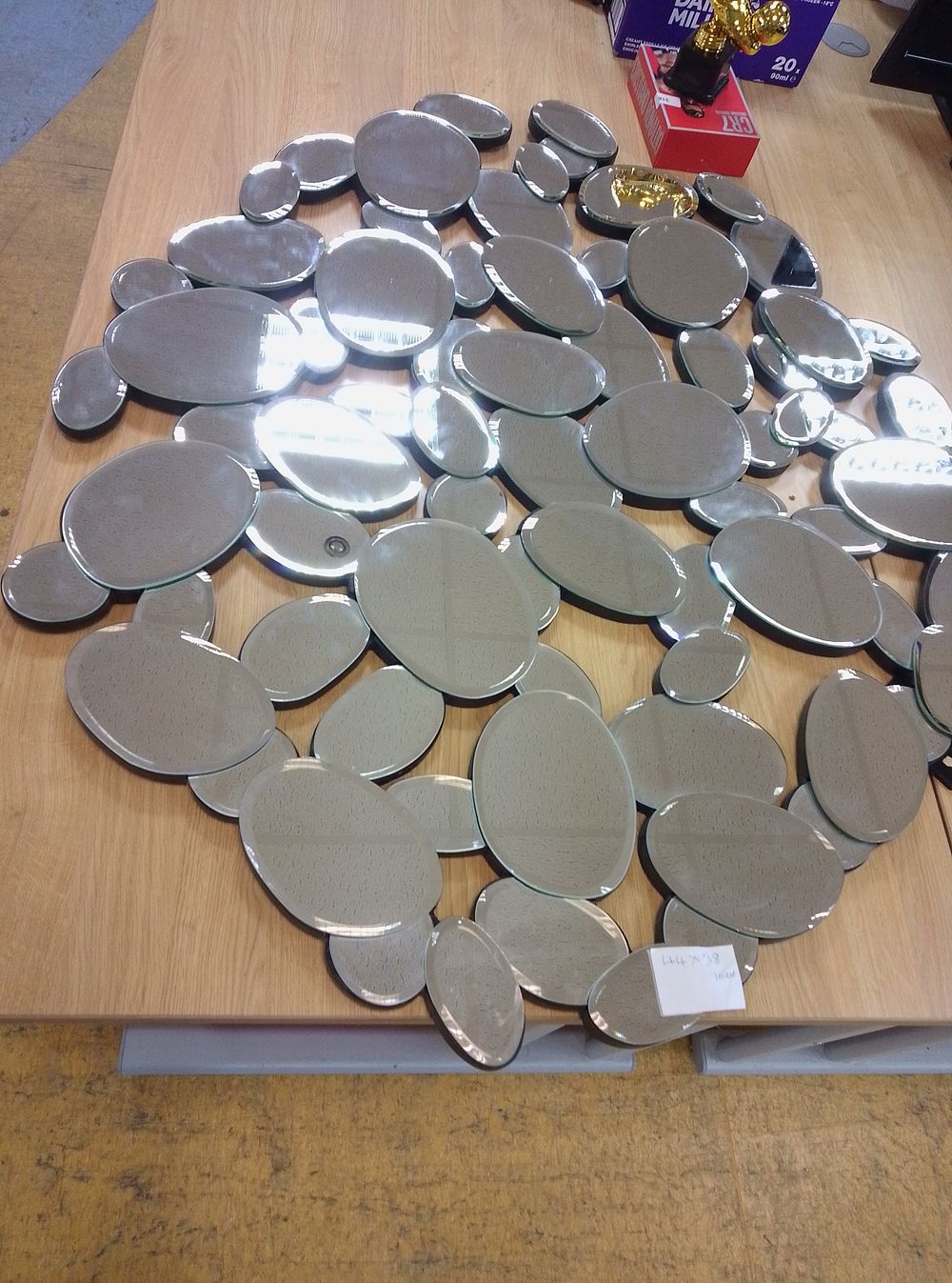 Lot 242: Dunelm Pebble 44" x 38" mirror