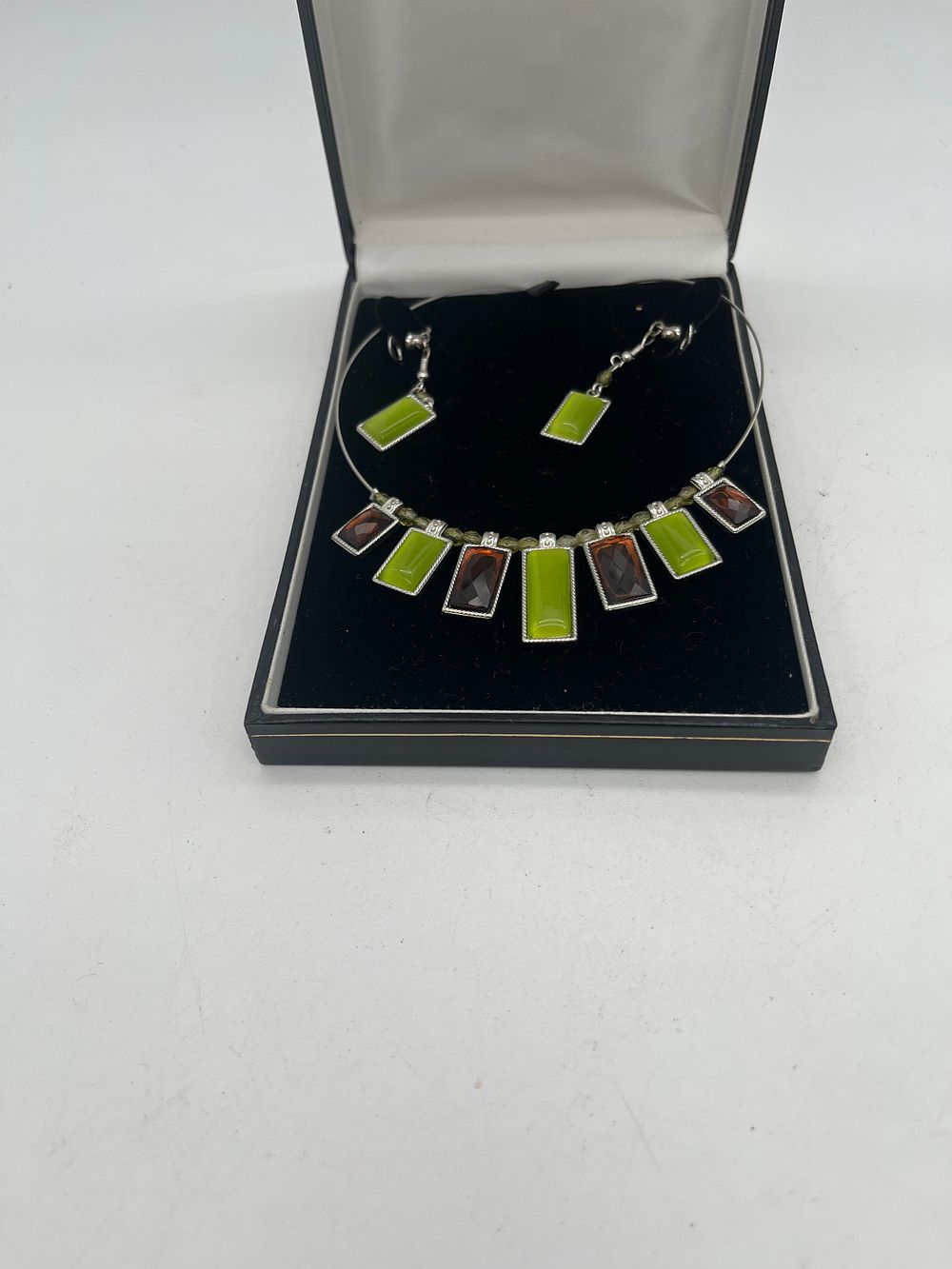 Lot 248: 1950s brown and green glass necklace and earring...
