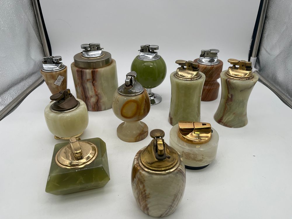 Lot 250: A collection of marble and soap stone lighters