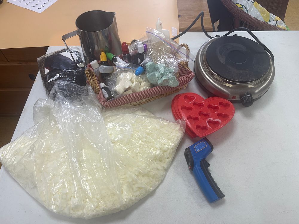 Lot 298: Candle making items everything you need. Heater molds...