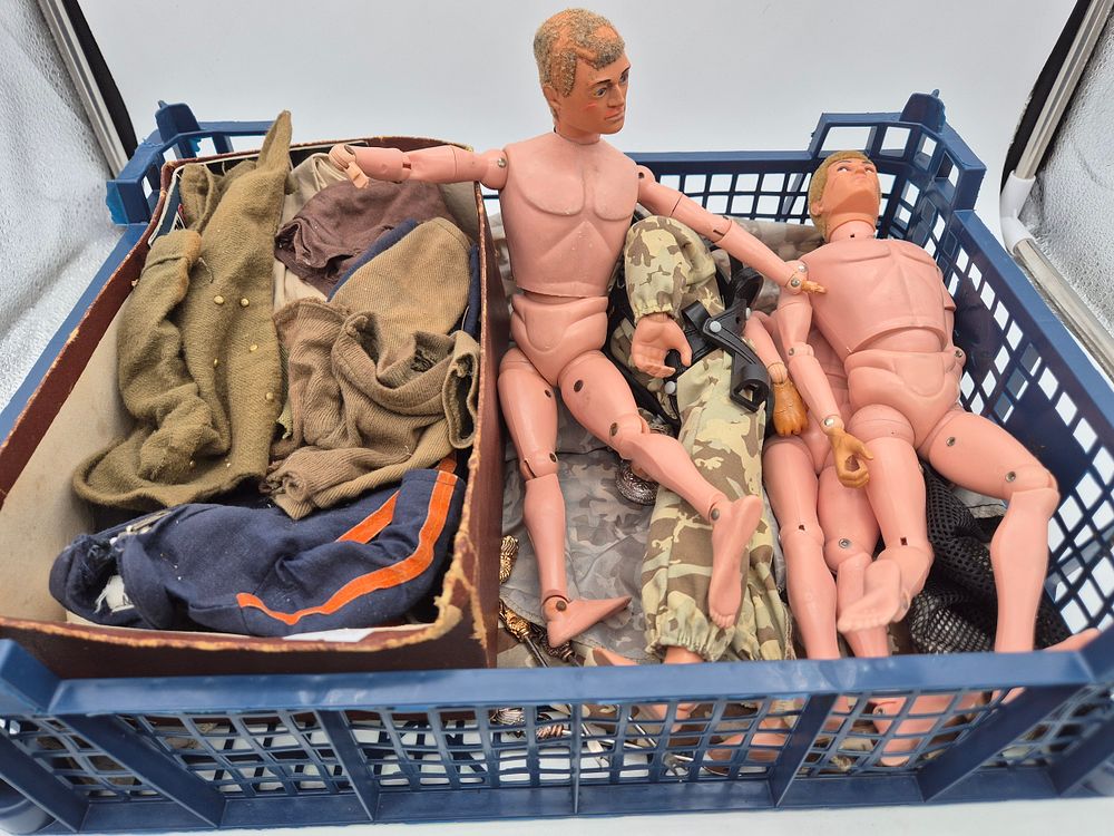 Lot 239: Collection of vintage action man figures and clothing