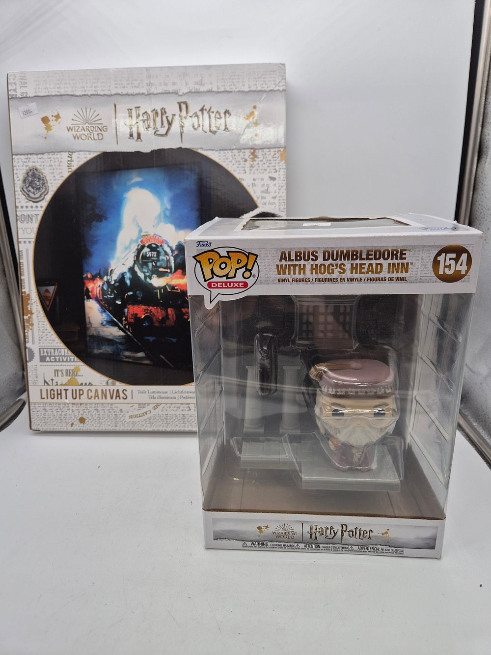 Lot 246: Harry Potter Light up Canvas, Pop Vinyl Harry...