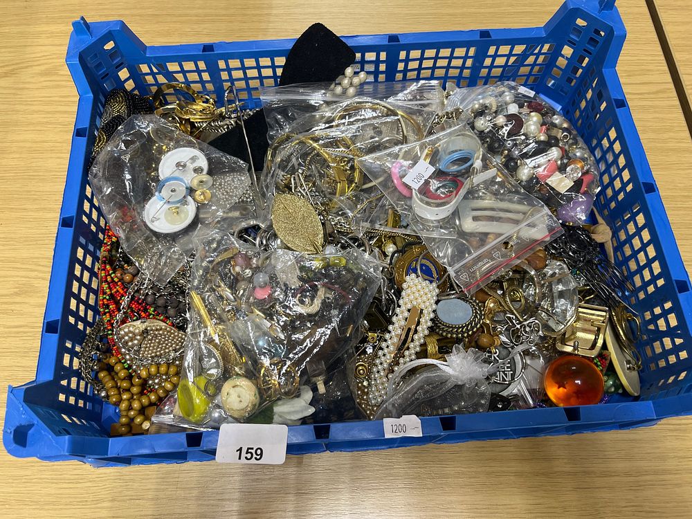Lot 159: A basket full of costume jewellery, basket not...