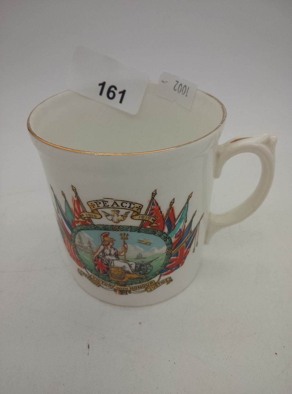 Lot 161: WWI peace cup 1919 Fords China 8cm tall