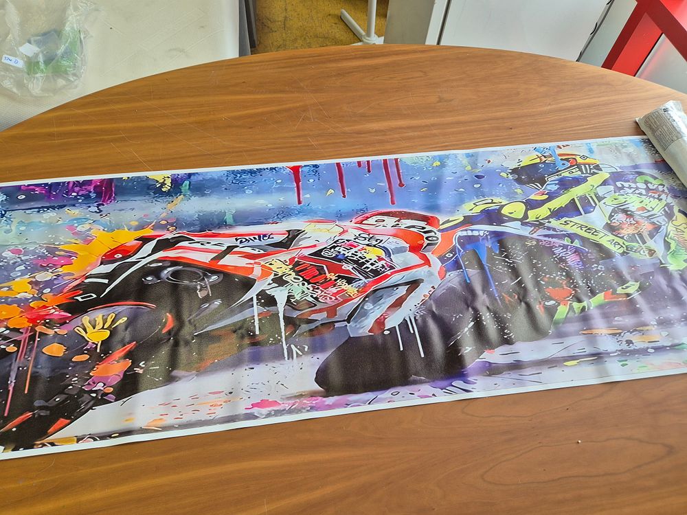 Lot 237: 2 Helmet Posters of Bike racing