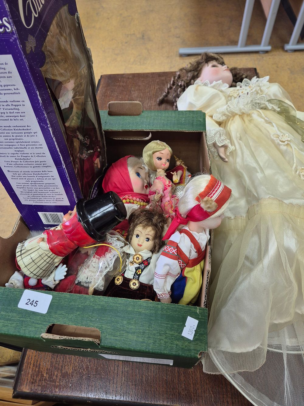 Lot 245: Box of dolls and large collectors doll