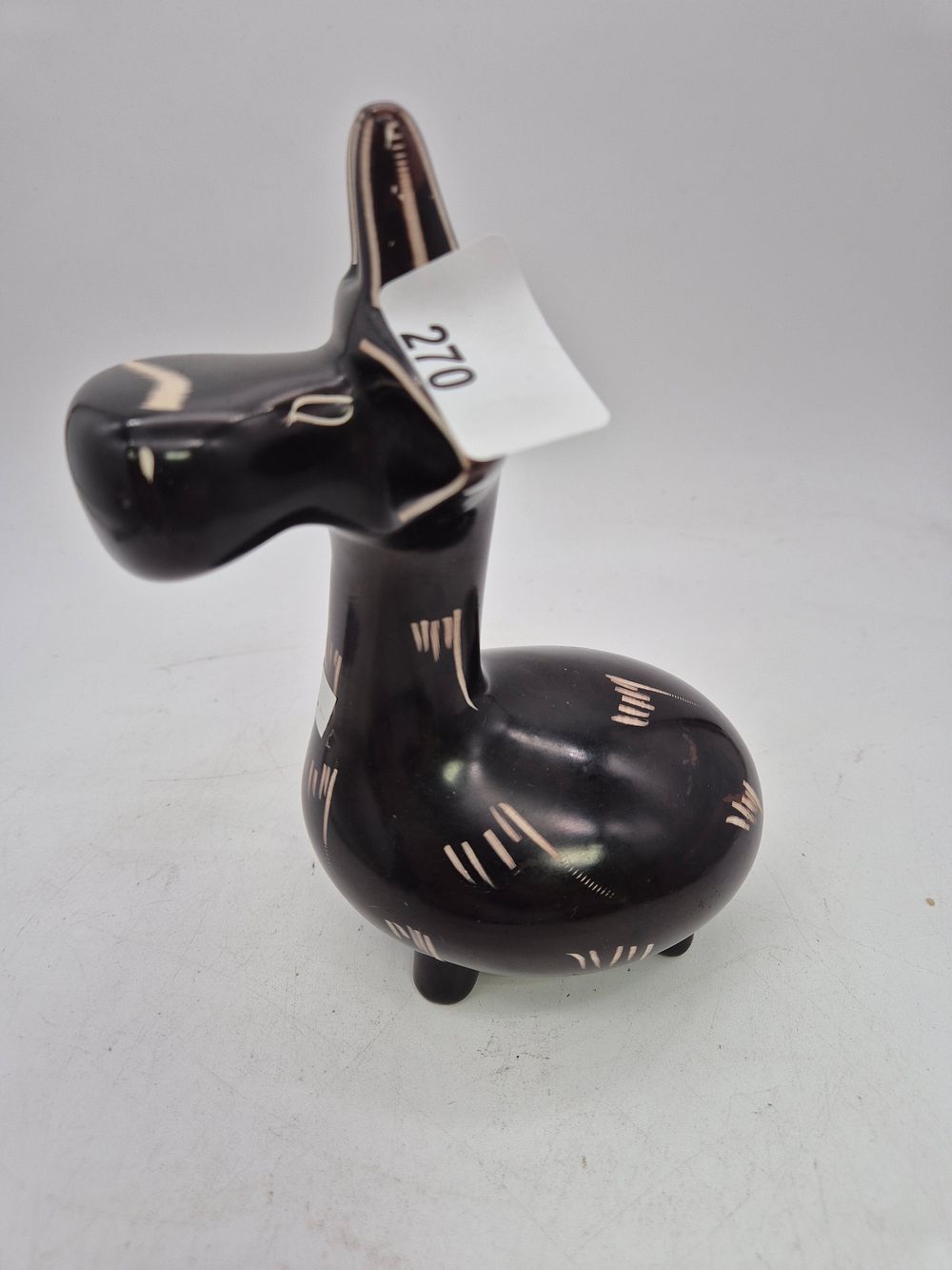 Lot 270: Modern ceramic giraffe