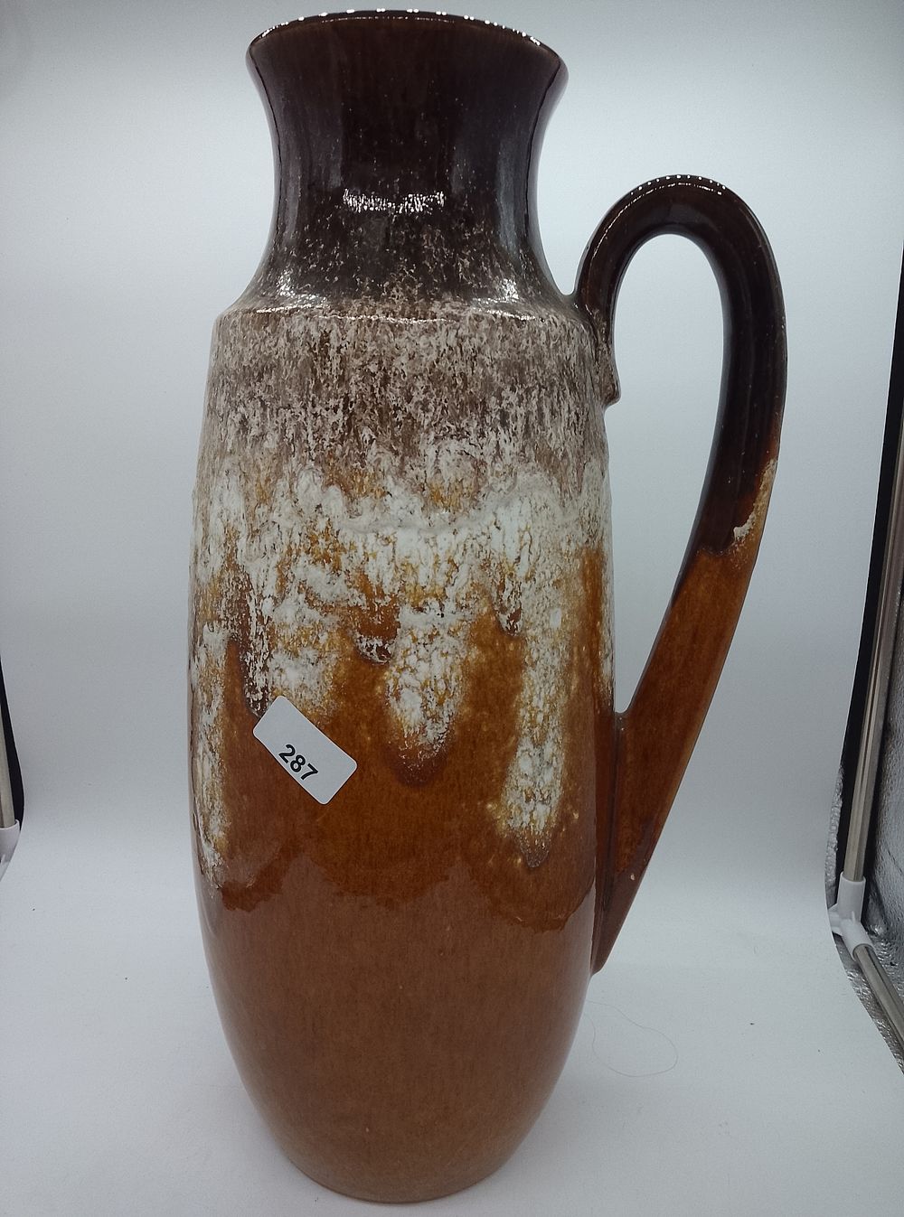 Lot 287: West German studio art Pottery jug with handle...