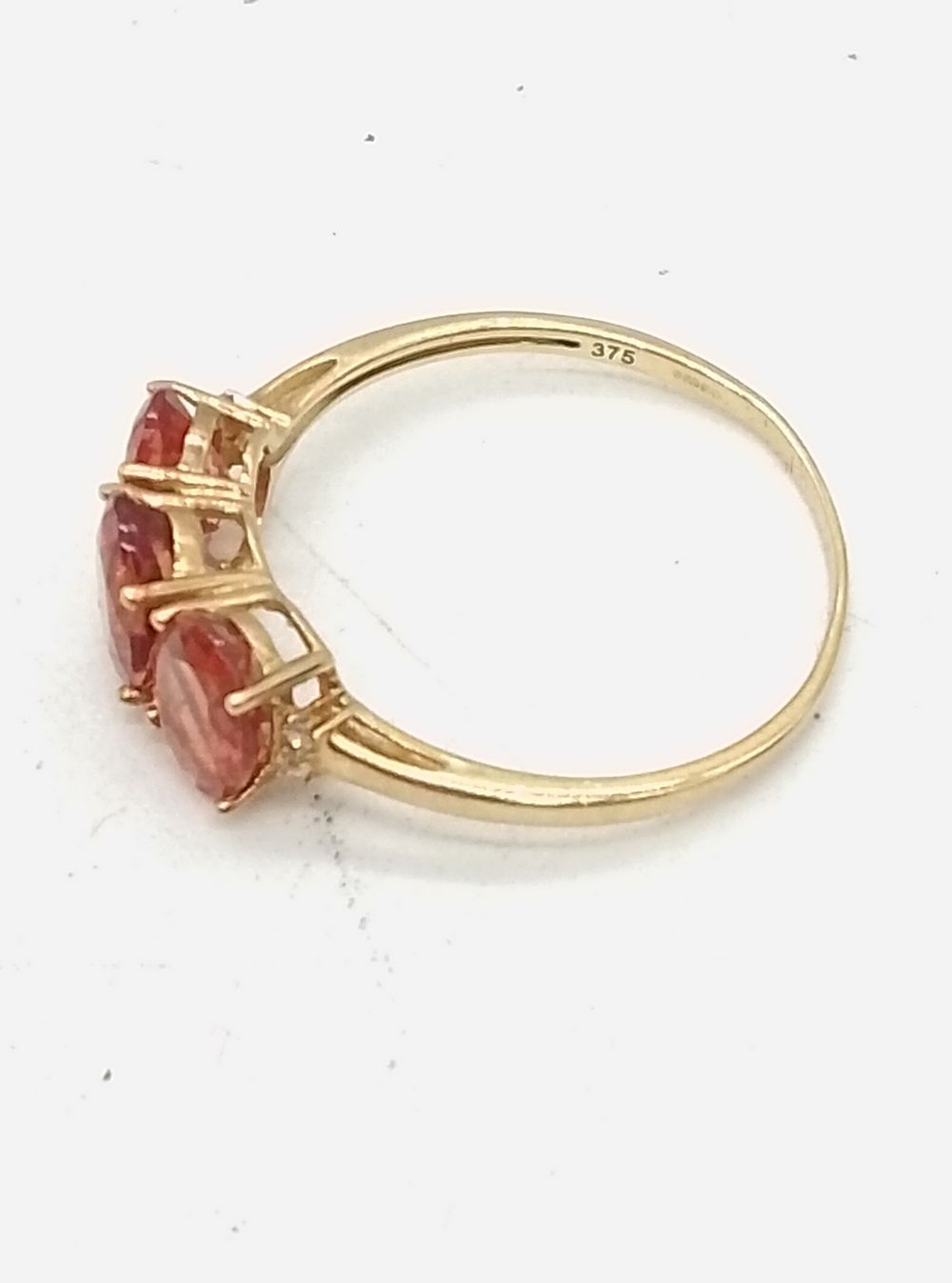 Lot 159: A 9ct Yellow Gold Three-Stone Ametrine Gemstone Ring...