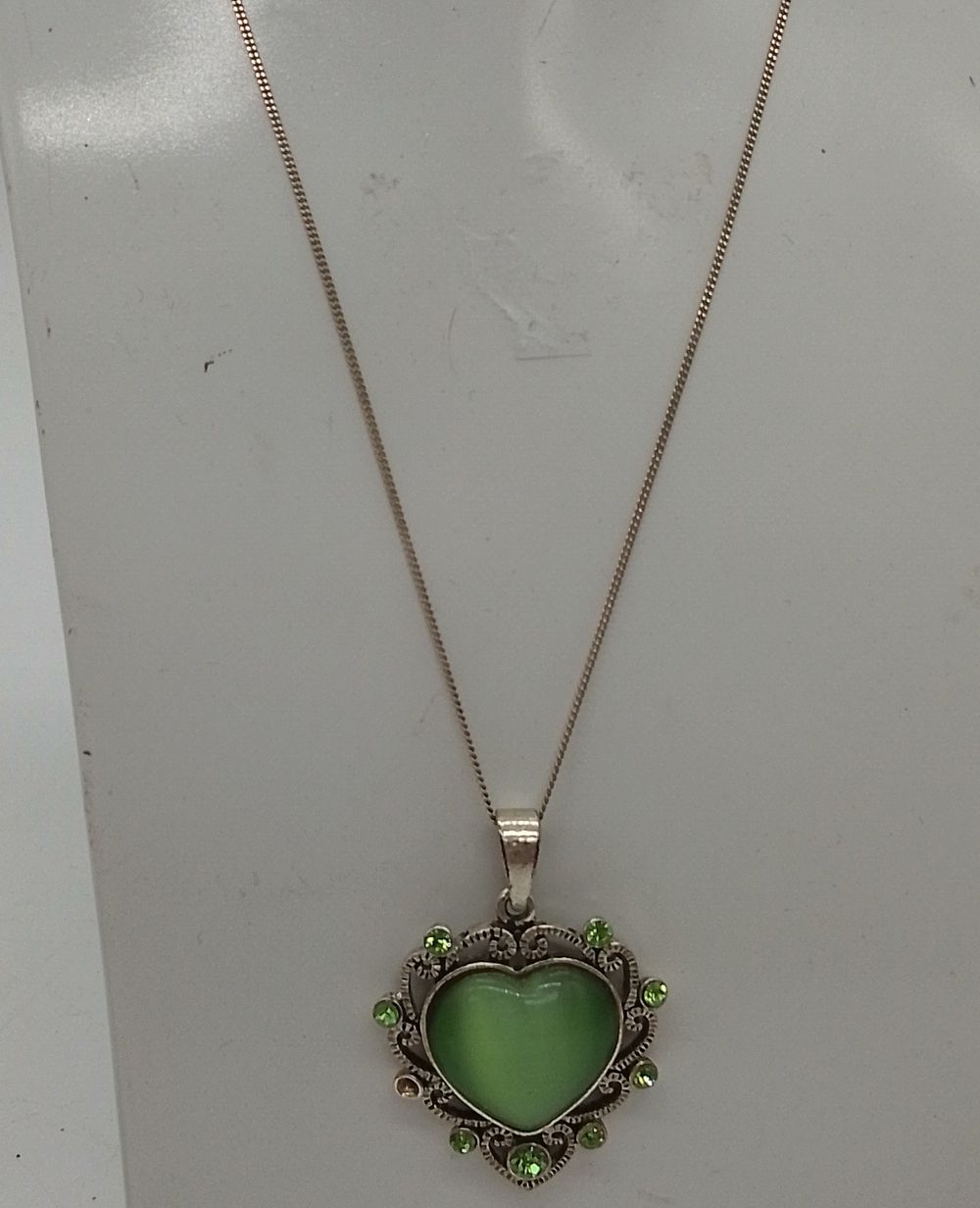 Lot 169: Sterling Silver Pendant Necklace with Heart Shaped Green...