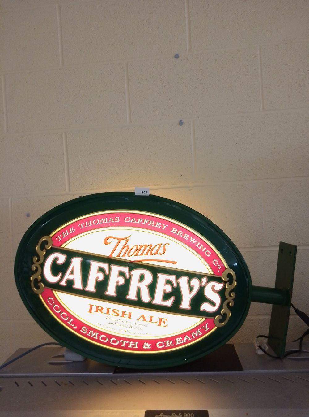 Lot 201: Double-sided illuminated Thomas Caffrey's Irish Ale pub sign