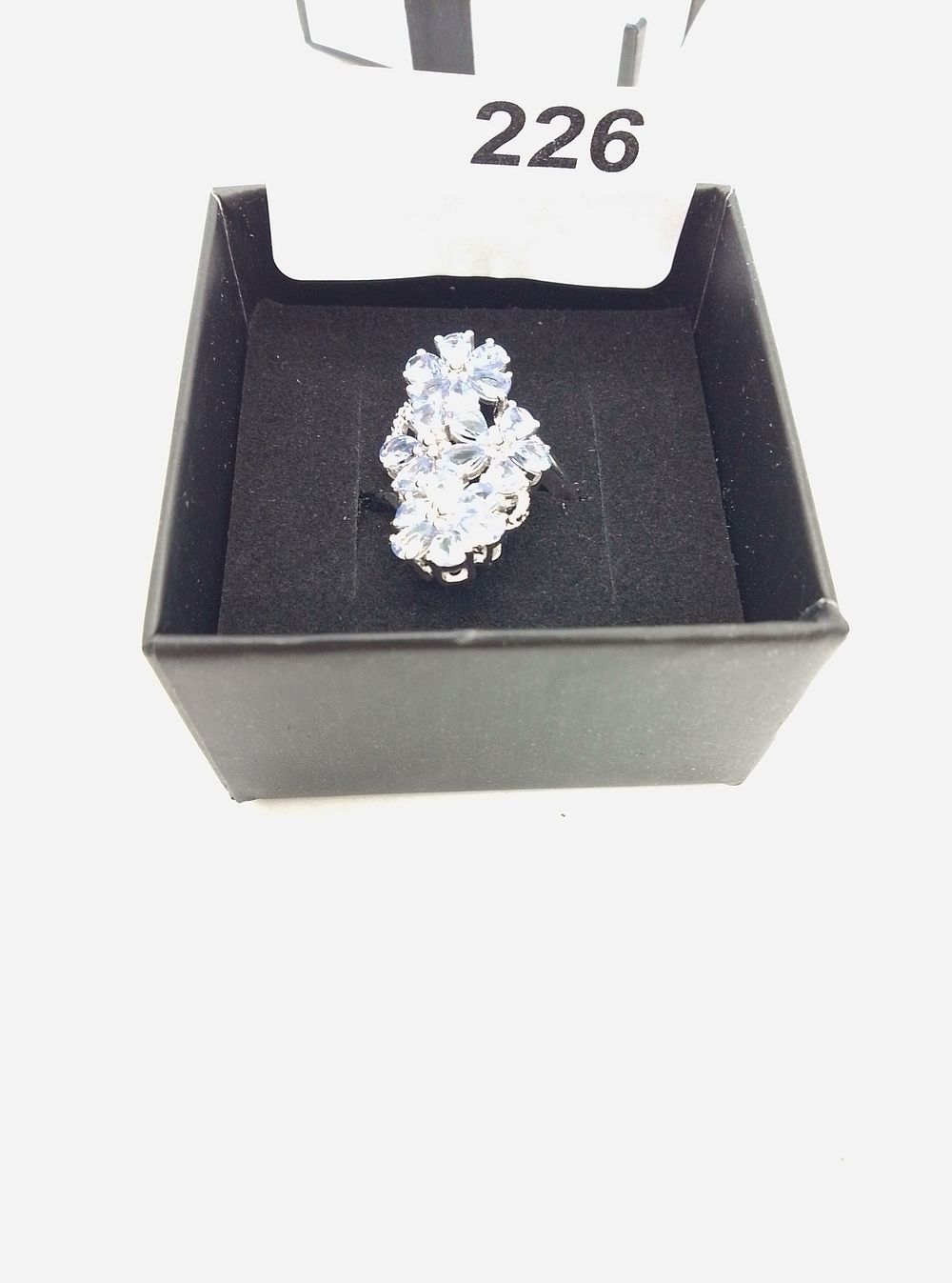 Lot 226: A Sterling Silver and Pale Violet-Blue Gemstone Floral...