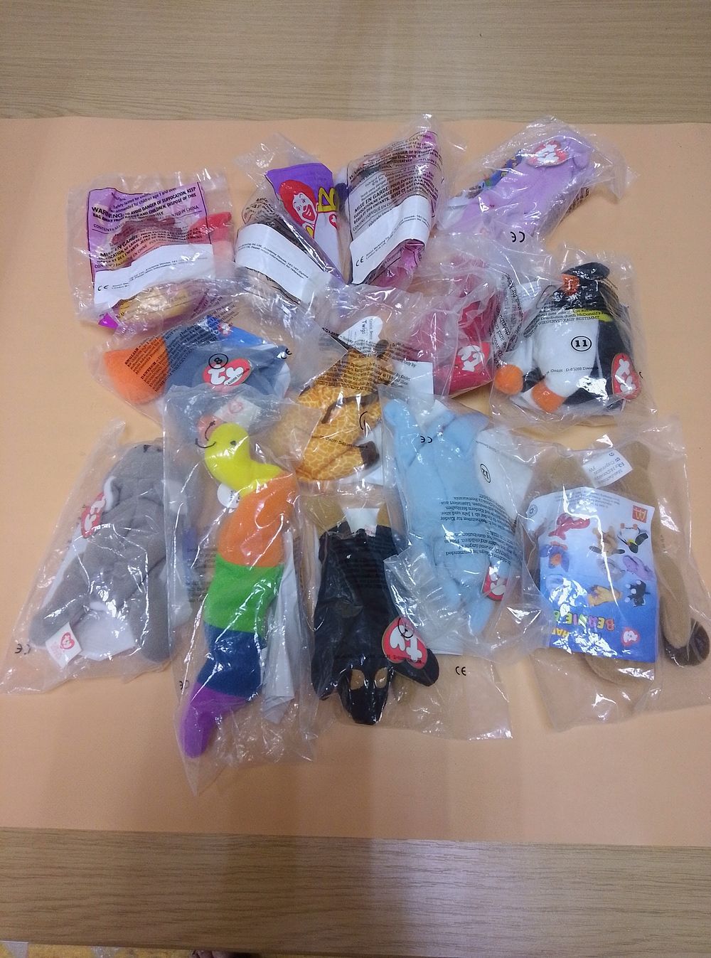 Lot 280: A Collection of 11 Ty Teenie Beanie Baby...