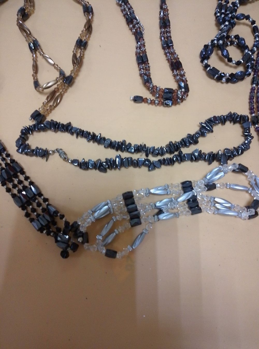 Lot 282: A Collection of Six Costume Jewellery Necklaces including...